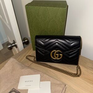 Gucci Black Quilted Leather Clutch with Gold Chain